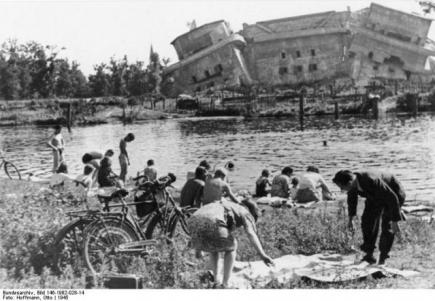 Pond in front of the destroyed bunker in Berlin Zoo (Flakturm III - Humboldthain).