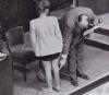 American medical expert Leo Alexander points to scars on the leg of Jadwiga Dzido, result of medical experiments at the Ravensbrueck concentration camp. 