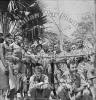 As a friendly gesture, natives brought in this live crocodile 12 miles to an australian officer