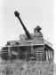 Tiger I tank with the commander in the tower.