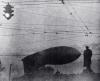 Barrage balloon hangs above the Alexander Pushkin monument.