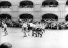 A soccer match, taken from a propaganda film. 