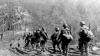 Military patrol from the BEF 1st Infantry Regiment advances towards Monte Castello.