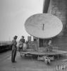 American WACs (Women's Army Corps) examining the radar atop German flak tower in the Tiergarten section of city following the capture of Berlin by Allied troops.