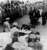 General Umezu signing the instrument of surrender.