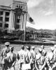 Japanese flag lowered during the surrender ceremony at the General Government Building.