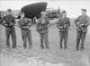 Aircrew of 58th Squadron displaying the defensive armament (M1919 Browning) of one of their Whitleys.
