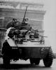 M8 Greyhound armored car passing under the Arc de Triomphe in the Liberation day of Paris.