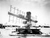 Three african-american soldiers manning US Army 90th Coast Artillery's radar.