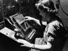 WAAF radar operator Denise Miley in the room at the  'Chain Home' receiver station.