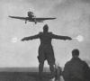 British Blackburn Skua aircraft approaching a carrier for landing.