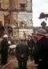 A London Civil Defense Rescue crew helps remove injured and dead civilians from destroyed buildings.
