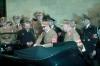 Ferdinand Porsche (left, in dark suit) presents a newly designed convertible VW to Adolf Hitler in celebration of the Fuhrer's 50th Birthday.