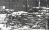 A section of a Chinese road blockade defended by the 87th Chinese Division in a street of Shanghai.