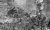 Chinese soldiers taking position in a bombed-out building in Shanghai.