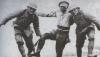 Two Japanese soldiers helping a wounded comrade off the battlefield near Suzhou Creek.