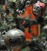 The "sieg heil" and swastika baubles show how even the Christian tradition of Christmas was used to promote evil ideologies such as fascism.