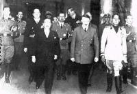 Emissary from Japan (on the left) and from Italy (on the right) accompanied by the german dictator Adolf Hitler after signing the Tripartite Pact.