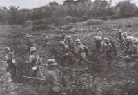 Chinese troops making a charge in Luodian, a suburban town of Shanghai.