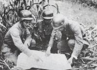 Officers of the Chinese 88th Division studying a map.