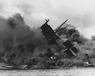 USS Arizona burning.
