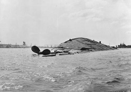 USS Oklahoma after Pearl Harbor attack.