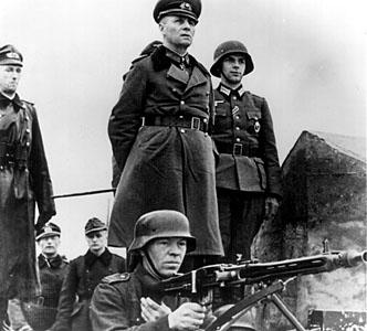 Rommel inspecting Atlantic coast defenses along the French coast.