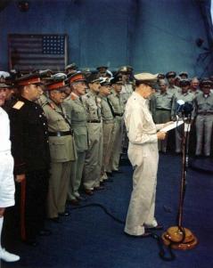 General MacArthur reads his speech at the formal Japanese surrender ceremony aboard Missouri.