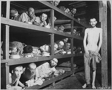 These are slaves laborers in the Buchenwald concentration camp; many had died from malnutrition when the camp were liberated.