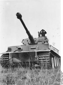 Tiger I tank with the commander in the tower.