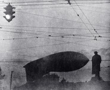 Barrage balloon hangs above the Alexander Pushkin monument.