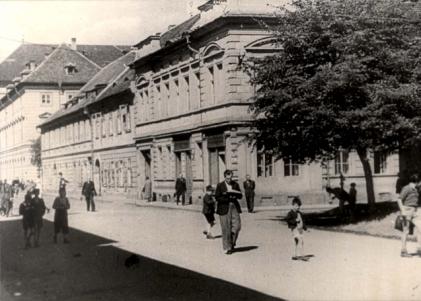 A street scene, taken from a propaganda film.