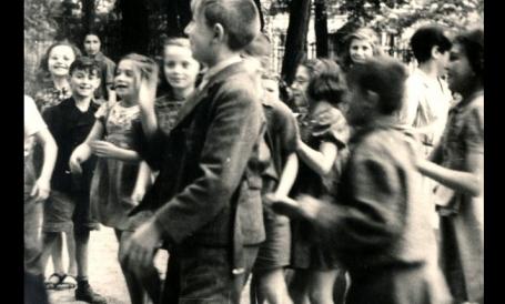 A photograph of Jewish children in Theresienstadt, taken by the Red Cross during their visit on 23 June 1943.