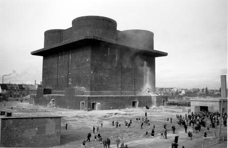 Wilhelmsburg bunker after an explosion for demolition where a small hole can be seen.