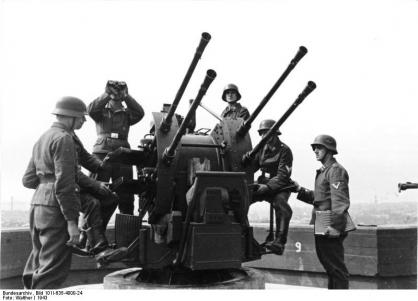 Flakvierling 38 anti-aircraft gun mounted on top of a Flak Tower.