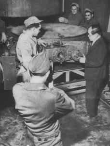 US soldiers with Nishima during the destruction of the cyclotrons.