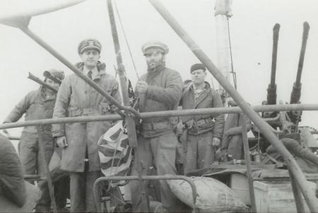 Raising of the American flag aboard the U-234.