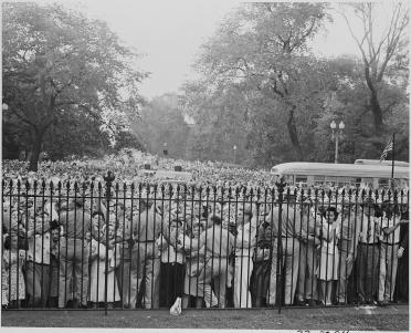 Huge crowd outside the White House gates celebrating the Japanese surrender.
