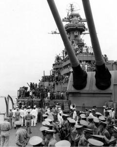 The surrender ceremony between Japan and the United States aboard USS Missouri.