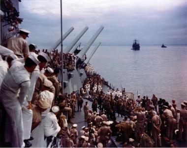 Lieutenant General Sutherland correcting Japanese surrender document.