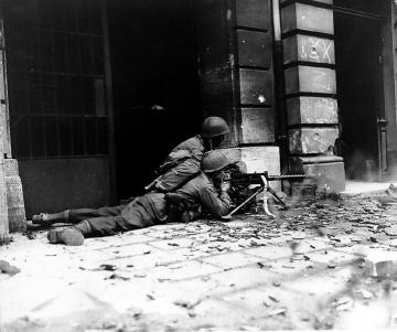 Soldiers (2nd Battalion, 26th Infantry) with a M1919 Browning fighting Nazi Wehrmacht.