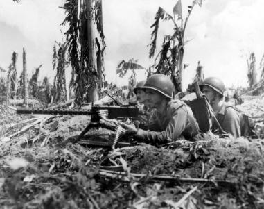 Three Marines and their M1919 Browning machine gun.