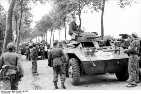 Captured American M8 armored cars.