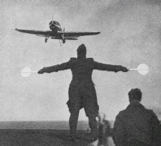 British Blackburn Skua aircraft approaching a carrier for landing.