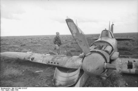 Hans-Joachim Marseille with a British Hurricane fighter that he had shot down.