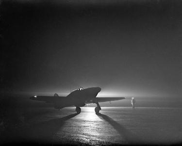 British Hurricane fighter of No. 85 Squadron RAF taxiing at Debden, Essex, England. This before taking off to intercept night raiders.