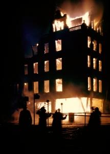 A London building ablaze during the Blitz.