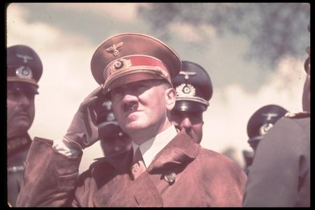 Hitler observes military maneuvers.