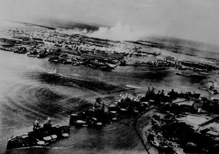 Captured Japanese photograph taken during the attack on Pearl Harbor. In the distance, the smoke rises from Hickam Field.