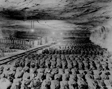 The 90th Division discovered this Reichsbank wealth, SS loot, and Berlin museum paintings that were removed from Berlin to a salt mine in Merkers, Germany.